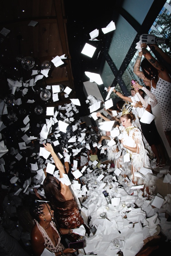 Napkins flying at the IKOS Party Brunch